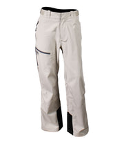A pair of beige shell pants with half-length side zippers, zippered hand pockets, a thigh pocket and an adjustable waistband.