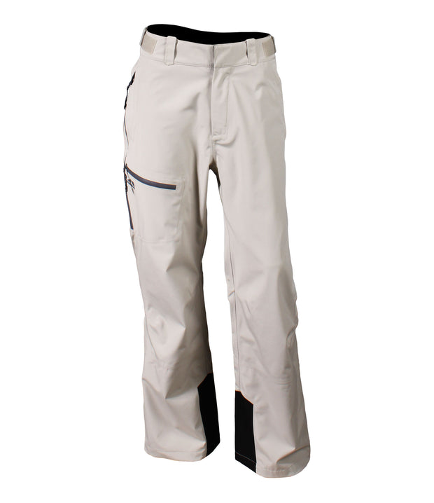 A pair of beige shell pants with half-length side zippers, zippered hand pockets, a thigh pocket and an adjustable waistband.