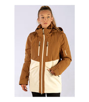 A woman wearing a two-tone insulated jacket with a brown hood, shoulders, upper chest, and upper sleeves, paired with a beige body and lower sleeves. The jacket features a front zip closure, two zippered chest pockets, and two side zip pockets, with an adjustable hood.