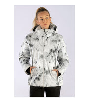 A woman wearing an insulated jacket with light grey with black abstract pattern, featuring a hood, zip closure, and designed for winter wear.