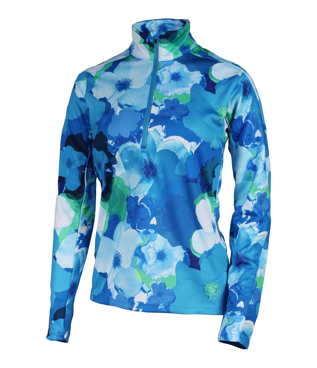 A women's 1/4 zip base layer with a floral print in blue, white and green colors.